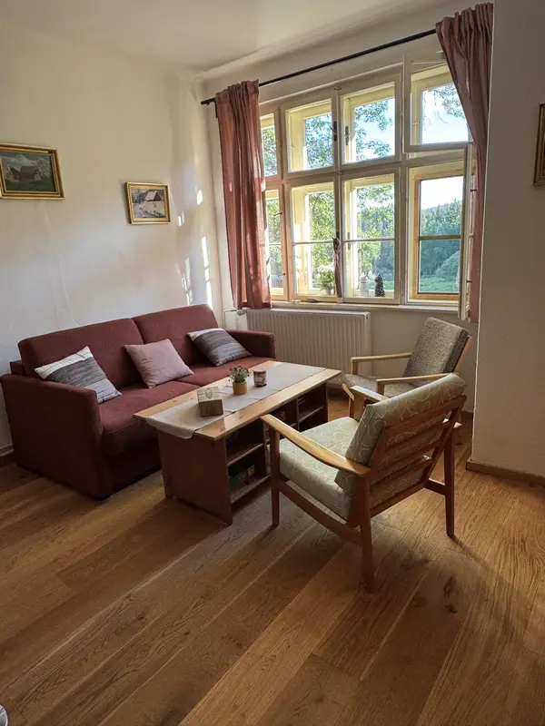 Prosklená veranda s pohodlným posezením